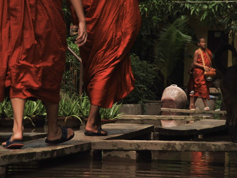 Buddhist monks walking in Kampot