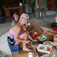 Guests chopping vegetables at a Kampot cooking class